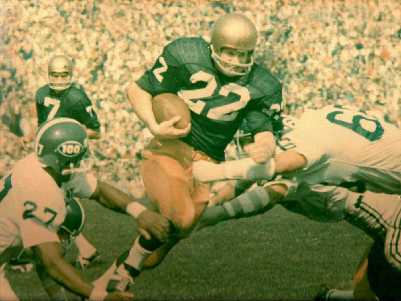 Notre Dame halfback Denny Allan carries the ball against Michigan State, September 1969