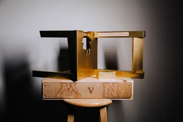 $5 Bits of Broken Chair Trophy between Nebraska &amp; Minnesota